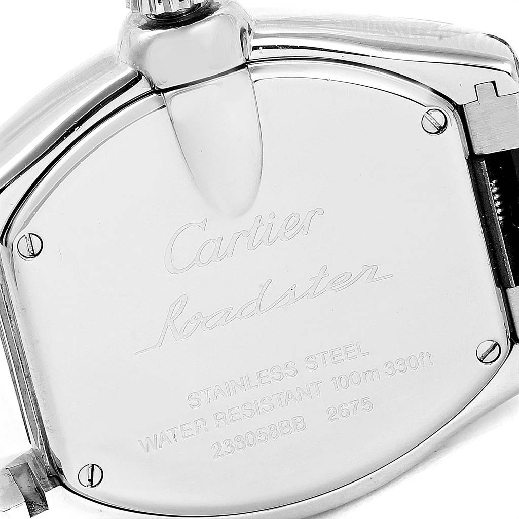 The image shows the back case of a Cartier Roadster W62016V3 Women
s Stainless Steel Silver Dial W62016V3 Women
s Stainless Steel Silver Dial watch, highlighting its stainless steel material and water resistance details.