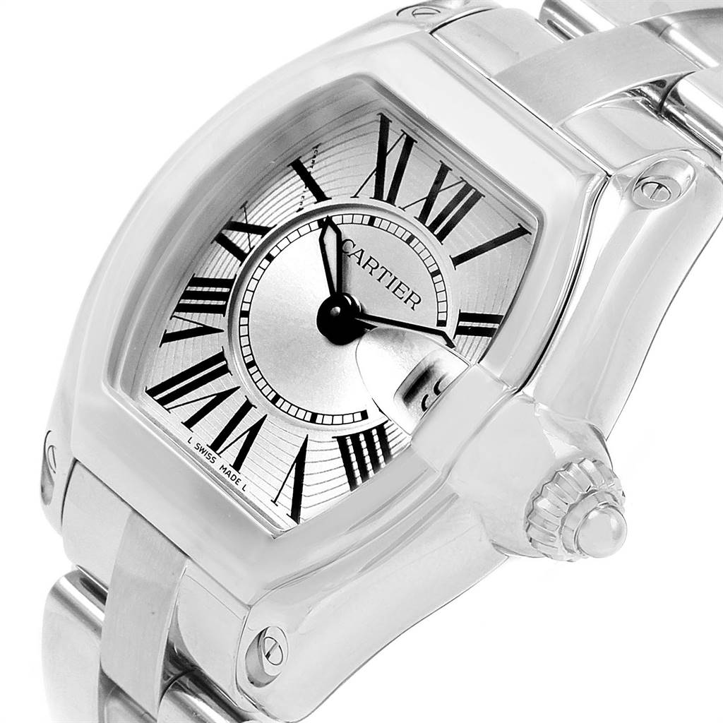 The image shows a close-up of the Cartier Roadster W62016V3 Women
s Stainless Steel Silver Dial W62016V3 Women
s Stainless Steel Silver Dial watch, highlighting the face, crown, and part of the bracelet.