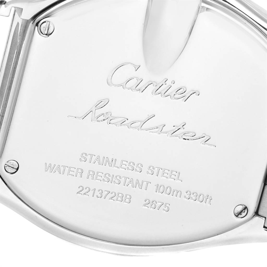 This image shows the stainless steel back case of a Cartier Roadster W62017V3 Women
s Stainless Steel Pink Dial W62017V3 Women
s Stainless Steel Pink Dial watch, detailing its water resistance and model numbers.