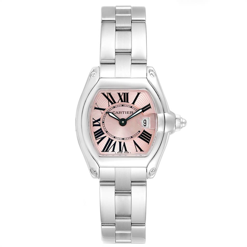 The image shows a front view of a Cartier Roadster W62017V3 Women
s Stainless Steel Pink Dial W62017V3 Women
s Stainless Steel Pink Dial watch with a pink dial and a metal bracelet.