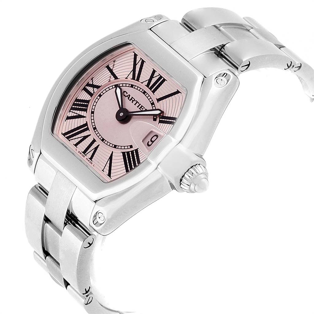 The image shows a front angled view of a Cartier Roadster W62017V3 Women
s Stainless Steel Pink Dial W62017V3 Women
s Stainless Steel Pink Dial watch, featuring its face, crown, and part of the bracelet.