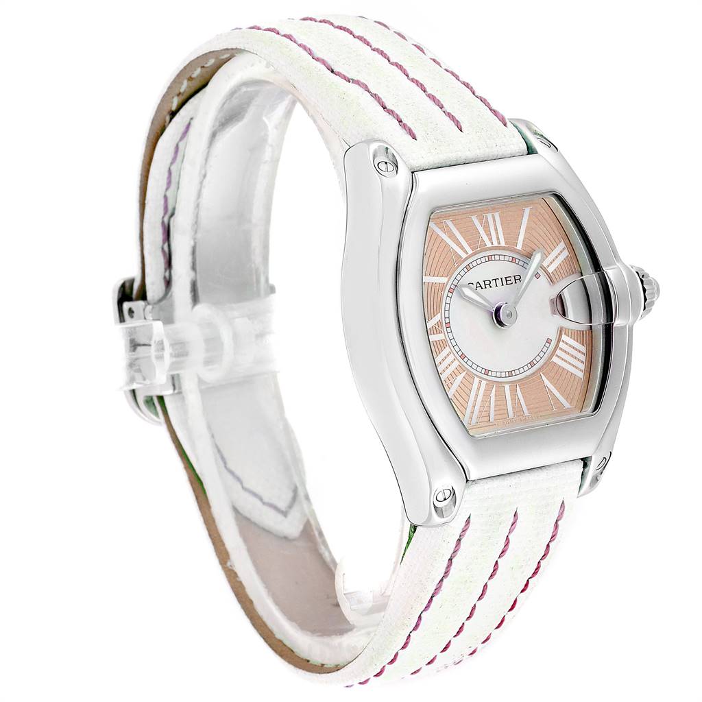 The Cartier Roadster W62054V3 Women's Stainless Steel Pink Dial W62054V3 Women's Stainless Steel Pink Dial watch is shown at an angle showcasing the face, bezel, crown, and partial strap.