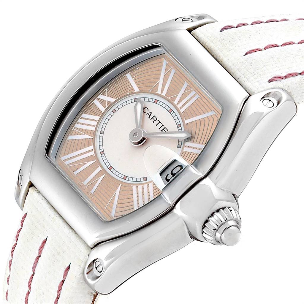The image shows a close-up angled view of a Cartier Roadster W62054V3 Women's Stainless Steel Pink Dial W62054V3 Women's Stainless Steel Pink Dial watch, highlighting the dial, crown, and part of the strap.