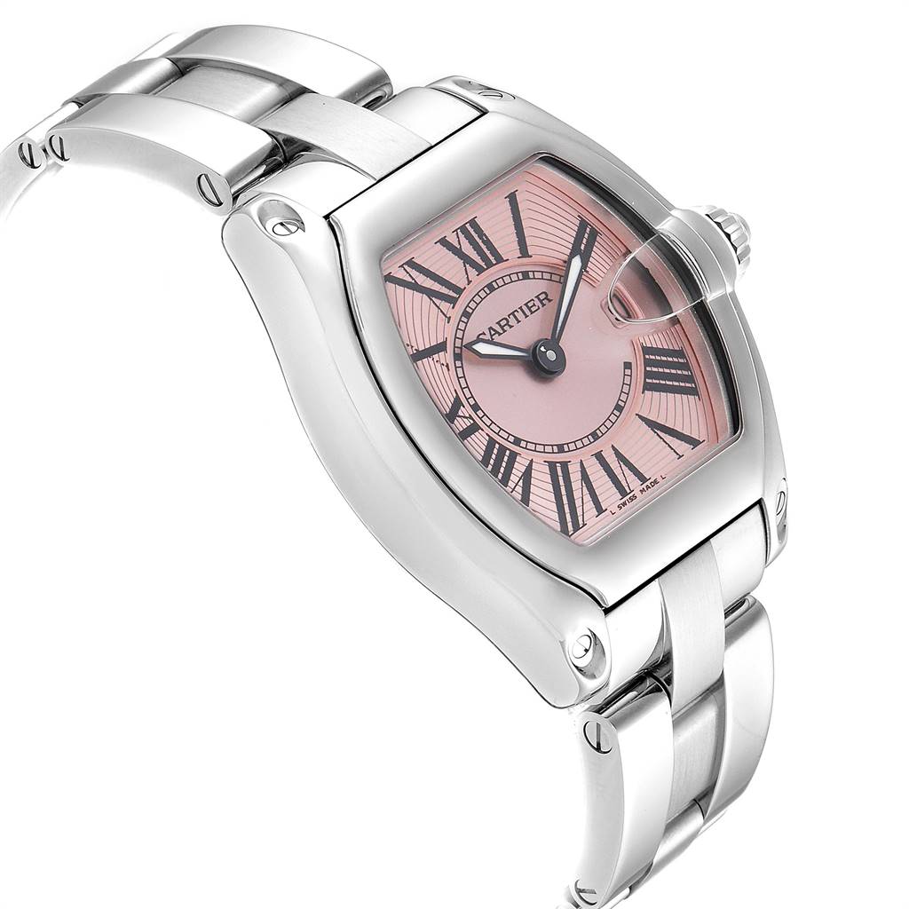 The image shows a Cartier Roadster W62017V3 Women's Stainless Steel Pink Dial W62017V3 Women's Stainless Steel Pink Dial watch at an oblique angle, highlighting the bezel, dial, hands, and part of the bracelet.