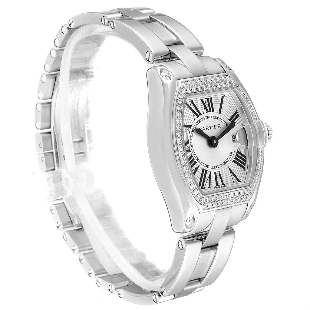 The image shows a Cartier Roadster WE5002X2 Women's White Gold Silver Dial WE5002X2 Women's White Gold Silver Dial watch from a front-left angle, highlighting its face, bezel, and part of the bracelet.