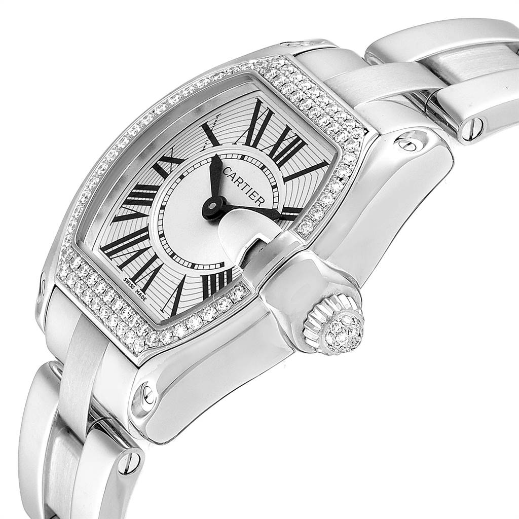 This image shows a close-up, angled view of the Cartier Roadster WE5002X2 Women's White Gold Silver Dial WE5002X2 Women's White Gold Silver Dial watch, highlighting the face, bezel, crown, and part of the bracelet.