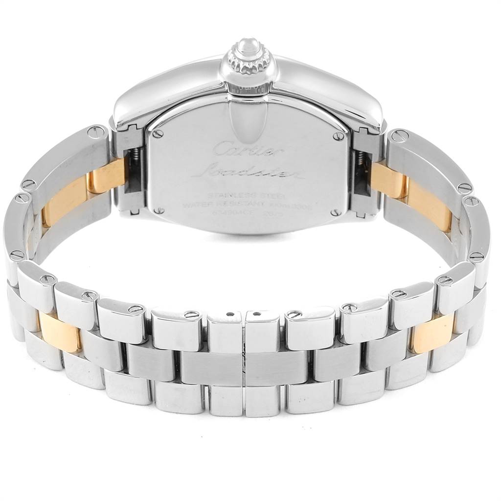 The image shows the back view of a Cartier Roadster W62026Y4 Women's Steel and Gold (two tone) Silver Dial W62026Y4 Women's Steel and Gold (two tone) Silver Dial watch, highlighting the clasp and stainless steel band with gold accents.