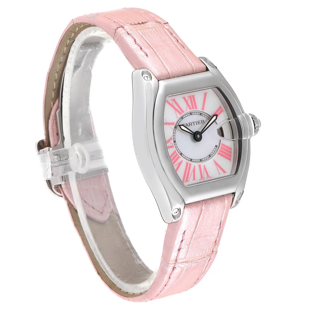 The image shows a Cartier Roadster W6206006 Women's Stainless Steel Mother of Pearl Dial W6206006 Women's Stainless Steel Mother of Pearl Dial watch from a slightly angled side view, highlighting its pink strap and rectangular dial.