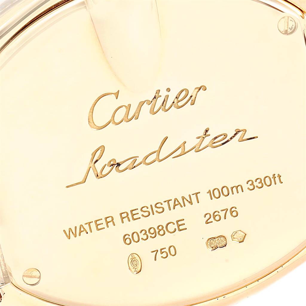 This image shows the engraved back case of a Cartier Roadster W62018Y5 Women
s Yellow Gold Silver Dial W62018Y5 Women
s Yellow Gold Silver Dial watch at a close angle.