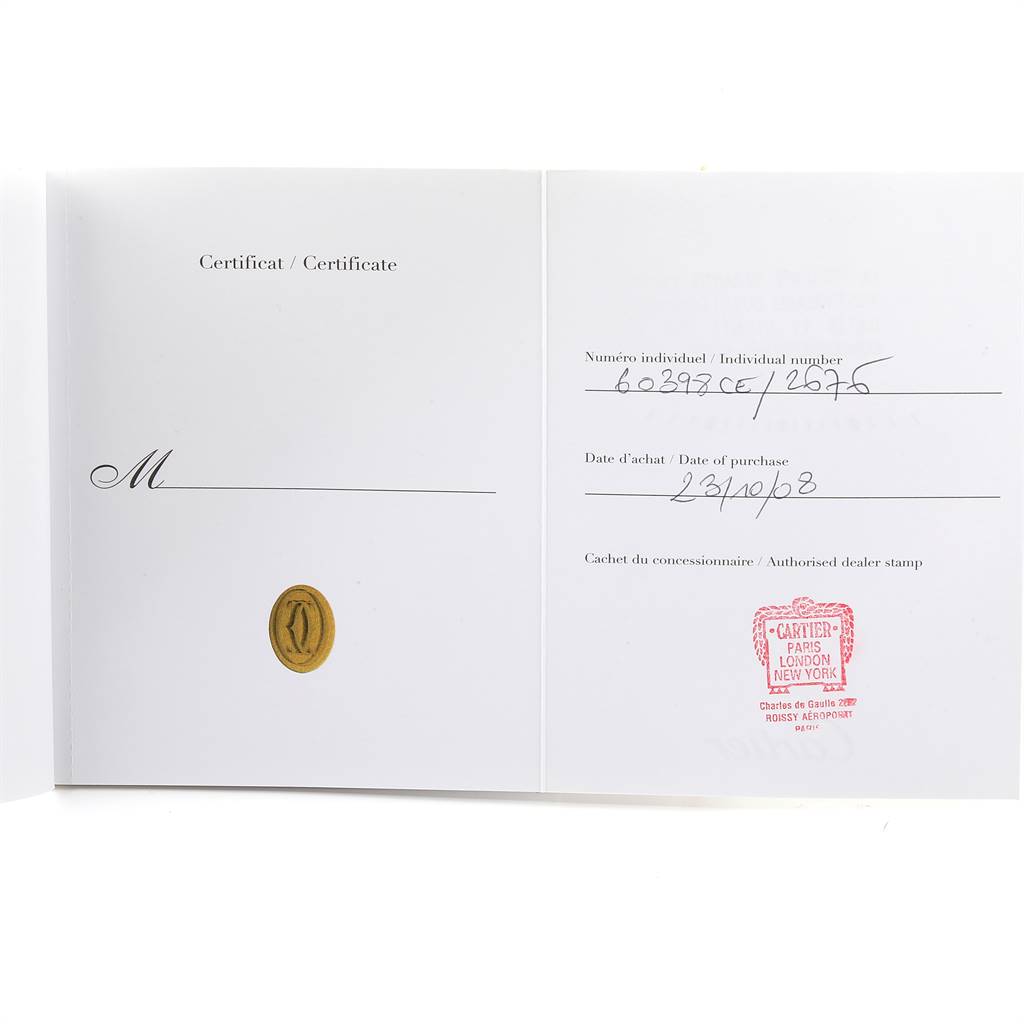 The image shows the certificate paperwork for a Cartier Roadster W62018Y5 Women
s Yellow Gold Silver Dial W62018Y5 Women
s Yellow Gold Silver Dial watch, displaying the purchase date and dealer stamp.