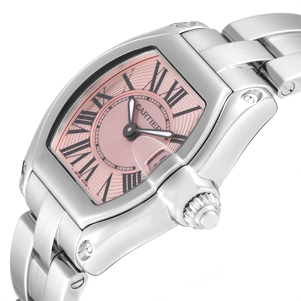 The image shows a close-up angle of the Cartier Roadster W62017V3 Women's Stainless Steel Pink Dial W62017V3 Women's Stainless Steel Pink Dial watch, highlighting its face, bezel, crown, and part of the bracelet.