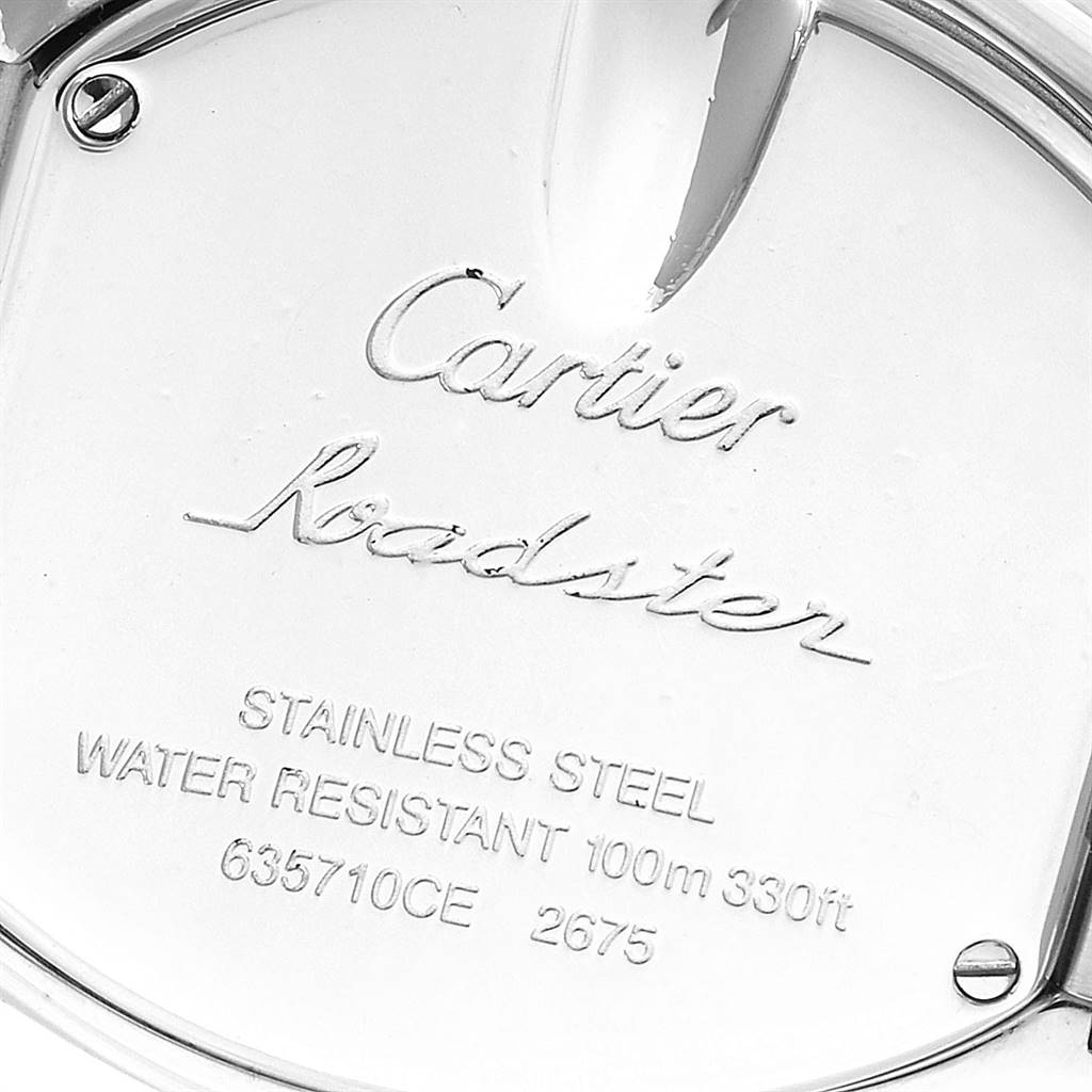 This image shows the back case of a Cartier Roadster W62026Y4 Women's Steel and Gold (two tone) Silver Dial W62026Y4 Women's Steel and Gold (two tone) Silver Dial watch, highlighting its brand engraving and water resistance information.