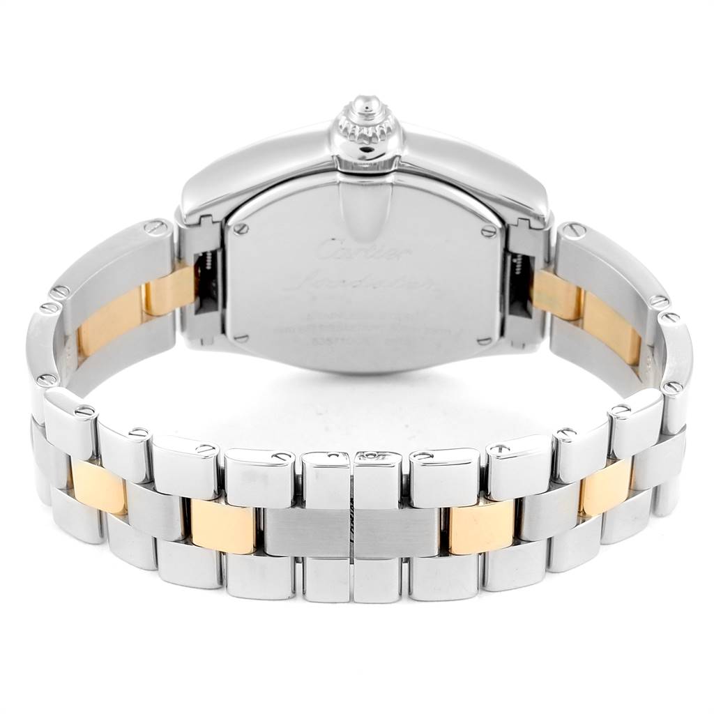 The image shows the back angle of a Cartier Roadster W62026Y4 Women's Steel and Gold (two tone) Silver Dial W62026Y4 Women's Steel and Gold (two tone) Silver Dial watch, highlighting its clasp and two-tone metal bracelet.
