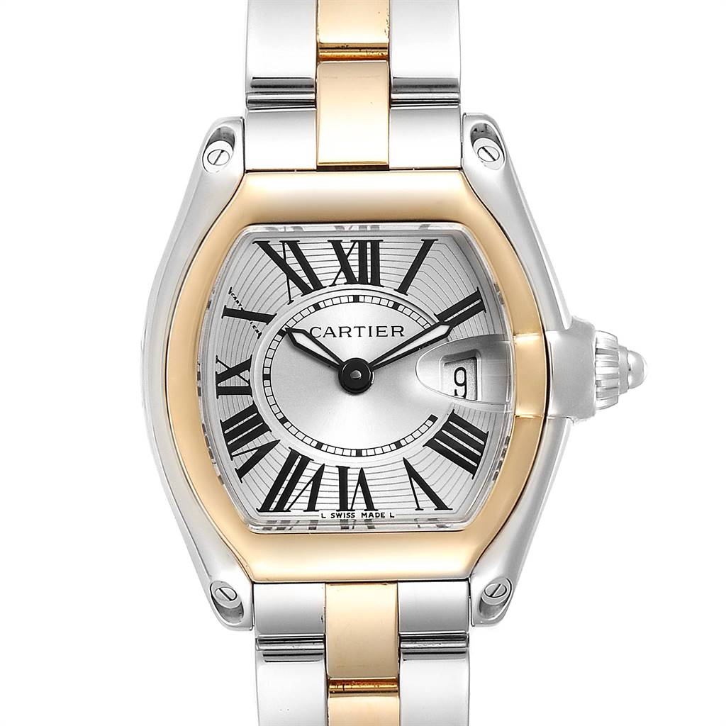This Cartier Roadster W62026Y4 Women's Steel and Gold (two tone) Silver Dial W62026Y4 Women's Steel and Gold (two tone) Silver Dial watch image is taken from a front angle, showcasing the dial, case, and part of the bracelet.