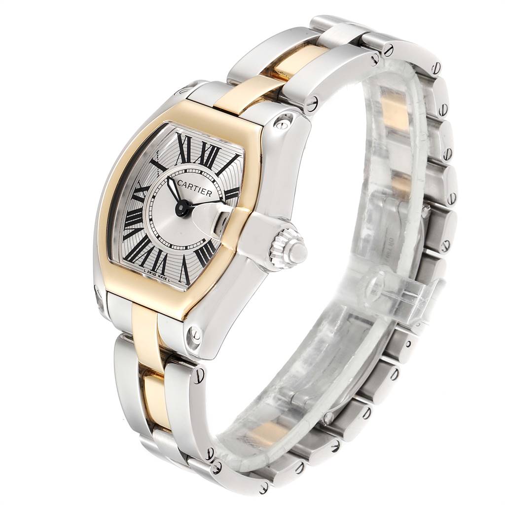 The Cartier Roadster W62026Y4 Women's Steel and Gold (two tone) Silver Dial W62026Y4 Women's Steel and Gold (two tone) Silver Dial watch is shown at an angle highlighting the face, bracelet, and crown, primarily displaying its front and side.