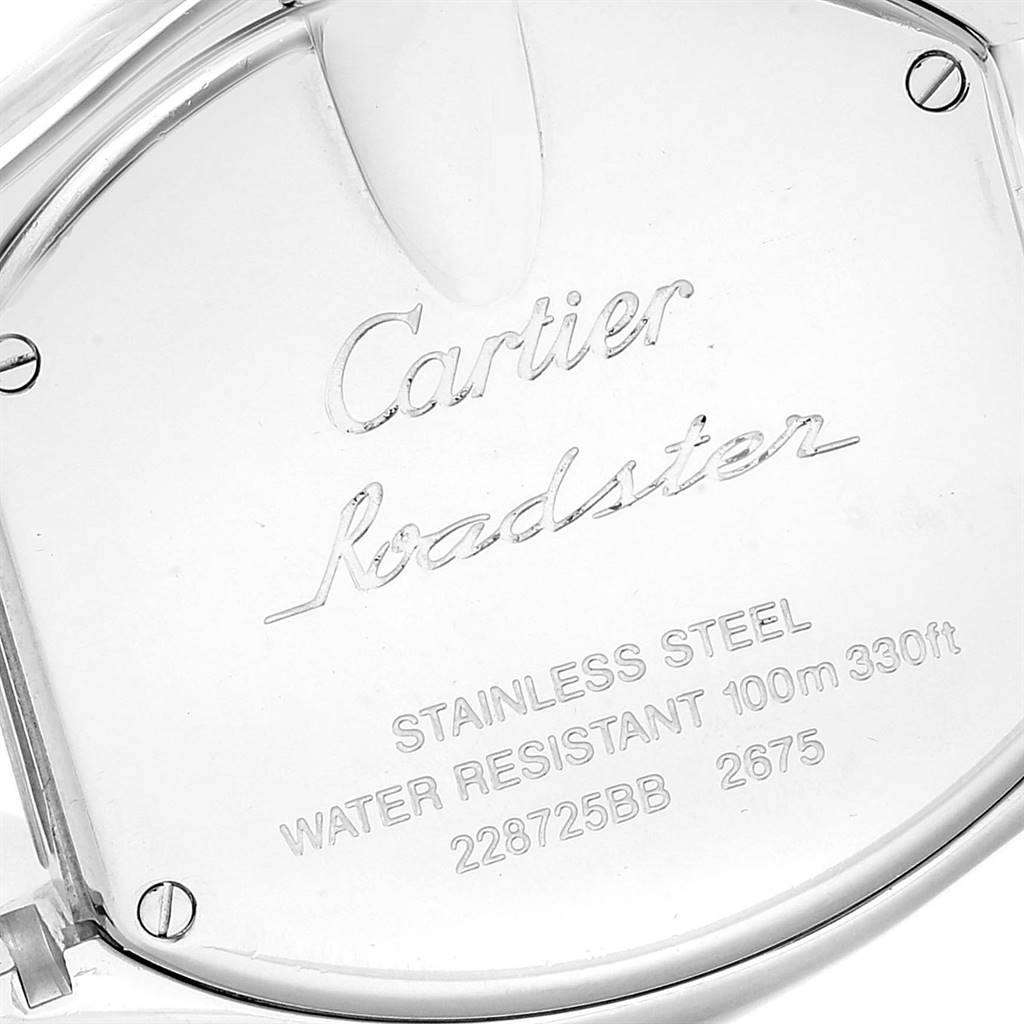 The image shows the case back of the Cartier Roadster W62017V3 Women's Stainless Steel Pink Dial W62017V3 Women's Stainless Steel Pink Dial watch, highlighting its engravings and screw details.