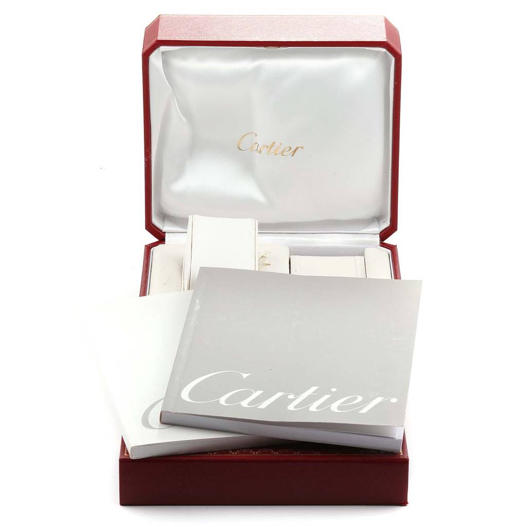 The image shows the packaging and accessories of a Cartier Roadster W62017V3 Women's Stainless Steel Pink Dial W62017V3 Women's Stainless Steel Pink Dial watch, including booklets and a red display box.