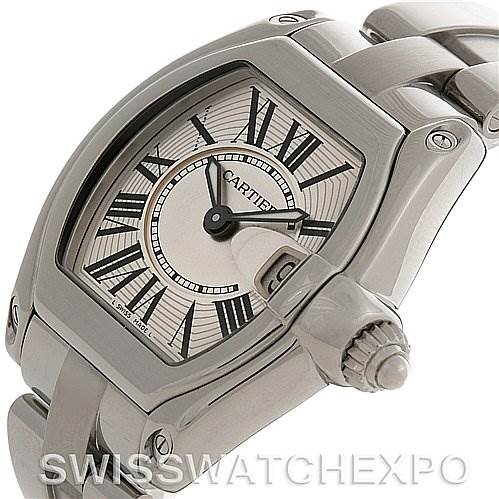 This image shows a Cartier Roadster W62016V3 Women's Stainless Steel Silver Dial W62016V3 Women's Stainless Steel Silver Dial watch from an oblique angle, highlighting the face, bezel, crown, and part of the band.