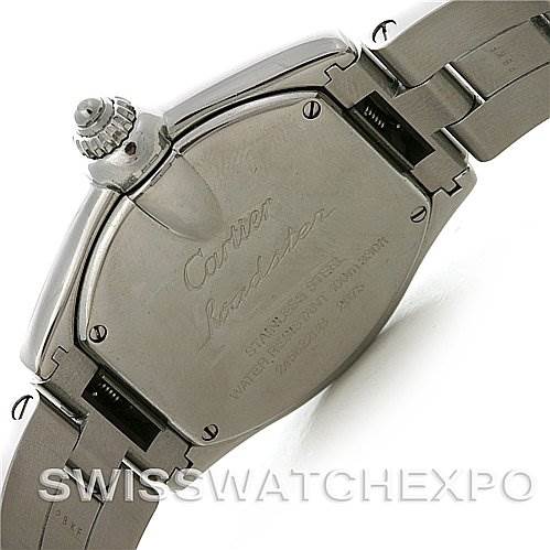 The image shows the back case and part of the bracelet of a Cartier Roadster W62016V3 Women
s Stainless Steel Silver Dial W62016V3 Women
s Stainless Steel Silver Dial watch at an angled view.