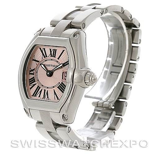 The image shows a Cartier Roadster W62017V3 Women's Stainless Steel Pink Dial W62017V3 Women's Stainless Steel Pink Dial watch from a three-quarter angle, displaying the face, crown, and bracelet.
