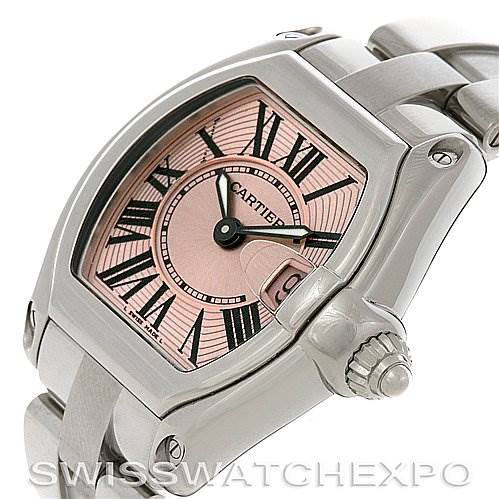 This image shows a close-up view of the Cartier Roadster W62017V3 Women's Stainless Steel Pink Dial W62017V3 Women's Stainless Steel Pink Dial watch, highlighting its dial, case, and part of the bracelet.