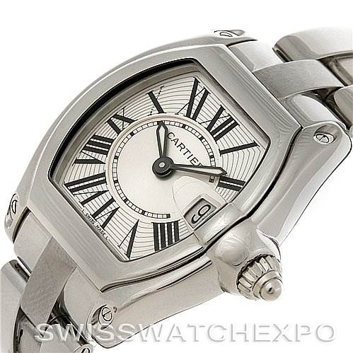 The image shows a Cartier Roadster W62016V3 Women
s Stainless Steel Silver Dial W62016V3 Women
s Stainless Steel Silver Dial model watch at an angled view, highlighting the dial, crown, and part of the bracelet.