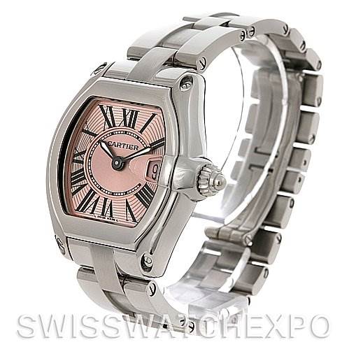 The image shows a Cartier Roadster W62017V3 Women
s Stainless Steel Pink Dial W62017V3 Women
s Stainless Steel Pink Dial watch angled to display the face, case, crown, and part of the metallic strap.