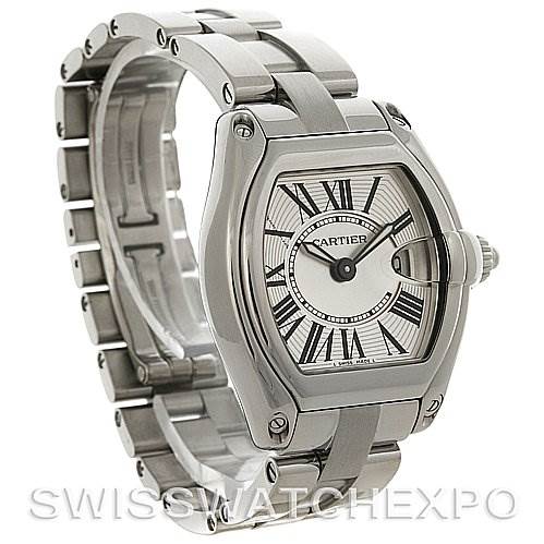 The image displays the Cartier Roadster W62016V3 Women
s Stainless Steel Silver Dial W62016V3 Women
s Stainless Steel Silver Dial watch from a front-left angle, showcasing the watch face, bezel, crown, and metal bracelet.