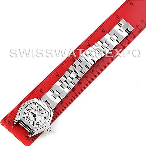 The image shows a Cartier Roadster W62016V3 Women
s Stainless Steel Silver Dial W62016V3 Women
s Stainless Steel Silver Dial watch laid flat, showcasing its face and entire bracelet on a ruler for scale.