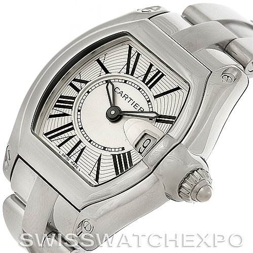 The image shows a close-up angle of the Cartier Roadster W62016V3 Women
s Stainless Steel Silver Dial W62016V3 Women
s Stainless Steel Silver Dial watch, highlighting the dial, crown, and part of the bracelet.