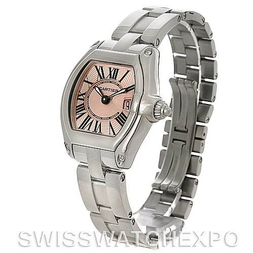The image shows a Cartier Roadster W62017V3 Women
s Stainless Steel Pink Dial W62017V3 Women
s Stainless Steel Pink Dial watch from a front-right angle, displaying the face, bracelet, and crown.
