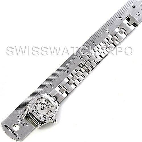 This image shows a Cartier Roadster W62016V3 Women
s Stainless Steel Silver Dial W62016V3 Women
s Stainless Steel Silver Dial watch laying flat and measured against a ruler, displaying its face and metal bracelet.