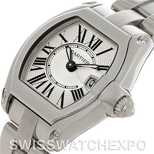 This image shows a close-up of the Cartier Roadster W62016V3 Women
s Stainless Steel Silver Dial W62016V3 Women
s Stainless Steel Silver Dial watch face and part of the stainless steel bracelet from a slightly angled perspective.