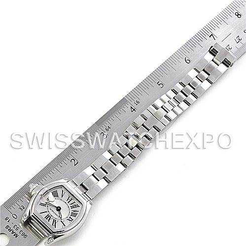 The image shows a Cartier Roadster W62016V3 Women
s Stainless Steel Silver Dial W62016V3 Women
s Stainless Steel Silver Dial watch lying flat with its silver bracelet extended and measured with a ruler.