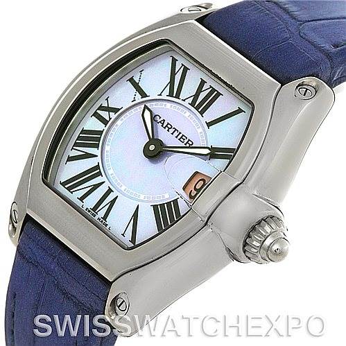 The image shows a front-side angled view of the Cartier Roadster W6206007 Women's Stainless Steel Mother of Pearl Dial W6206007 Women's Stainless Steel Mother of Pearl Dial watch, highlighting the dial, crown, and part of the blue strap.