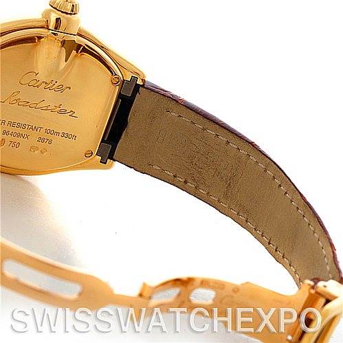This image shows the back case and leather strap of a Cartier Roadster W62018Y5 Women's Yellow Gold Silver Dial W62018Y5 Women's Yellow Gold Silver Dial watch, including the brand and model engraving.