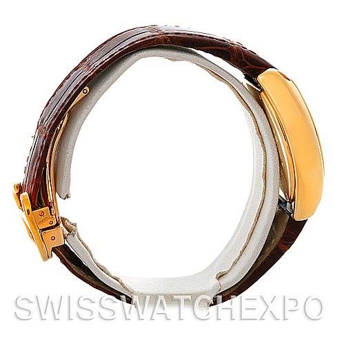 This image shows a side view of the Cartier Roadster W62018Y5 Women's Yellow Gold Silver Dial W62018Y5 Women's Yellow Gold Silver Dial watch, highlighting its leather strap and gold clasp.