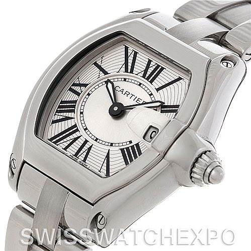 The image shows a close-up of a Cartier Roadster W62016V3 Women
s Stainless Steel Silver Dial W62016V3 Women
s Stainless Steel Silver Dial watch at an angle, highlighting the dial, case, and part of the bracelet.