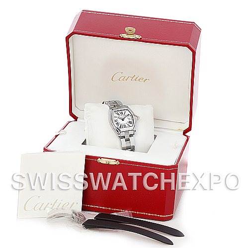 The Cartier Roadster W62016V3 Women's Stainless Steel Silver Dial W62016V3 Women's Stainless Steel Silver Dial watch is shown inside a red box with accessories and papers.