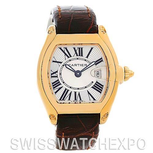 The image shows a Cartier Roadster W62018Y5 Women's Yellow Gold Silver Dial W62018Y5 Women's Yellow Gold Silver Dial watch from a front angle, featuring a gold-tone case, white dial with Roman numerals, and a brown leather strap.