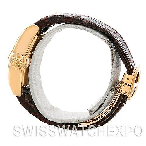 The image shows a side view of a Cartier Roadster W62018Y5 Women's Yellow Gold Silver Dial W62018Y5 Women's Yellow Gold Silver Dial watch highlighting the crown, strap, and clasp.