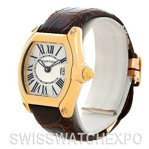 The image shows a Cartier Roadster W62018Y5 Women's Yellow Gold Silver Dial W62018Y5 Women's Yellow Gold Silver Dial watch angled slightly to display the face, crown, and leather strap.