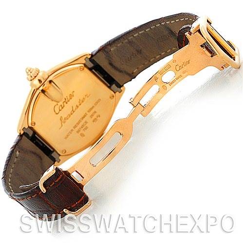 The image shows the backside and clasp of a Cartier Roadster W62018Y5 Women's Yellow Gold Silver Dial W62018Y5 Women's Yellow Gold Silver Dial watch, highlighting the leather strap and deployment clasp.