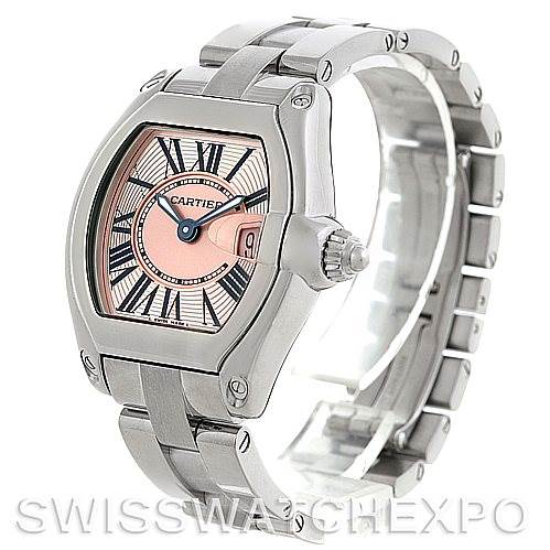 The image shows a Cartier Roadster W62017V3 Women's Stainless Steel Pink Dial W62017V3 Women's Stainless Steel Pink Dial watch at an angled side view, highlighting the face, bezel, crown, and bracelet.