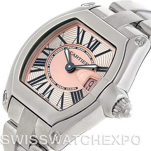 This image shows a close-up of the front and right side of a Cartier Roadster W62017V3 Women's Stainless Steel Pink Dial W62017V3 Women's Stainless Steel Pink Dial watch, highlighting its dial, crown, and part of its bracelet.