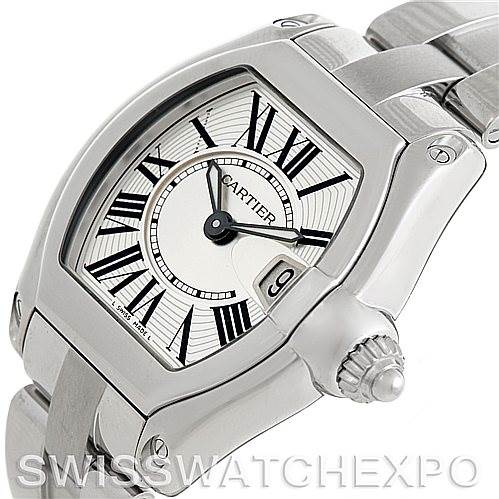 The image shows a close-up, angled view of the Cartier Roadster W62016V3 Women's Stainless Steel Silver Dial W62016V3 Women's Stainless Steel Silver Dial watch, highlighting its dial, crown, bezel, and part of the bracelet.