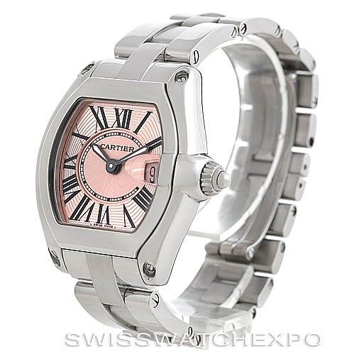 This image shows a side angle of a Cartier Roadster W62017V3 Women's Stainless Steel Pink Dial W62017V3 Women's Stainless Steel Pink Dial watch, highlighting its pink dial, stainless steel case, and bracelet.