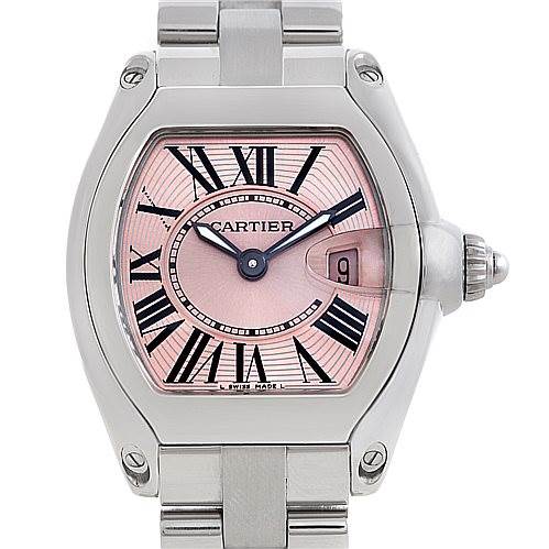 This image shows a Cartier Roadster W62017V3 Women's Stainless Steel Pink Dial W62017V3 Women's Stainless Steel Pink Dial watch from a front angle, highlighting the pink dial, Roman numerals, and metallic strap.