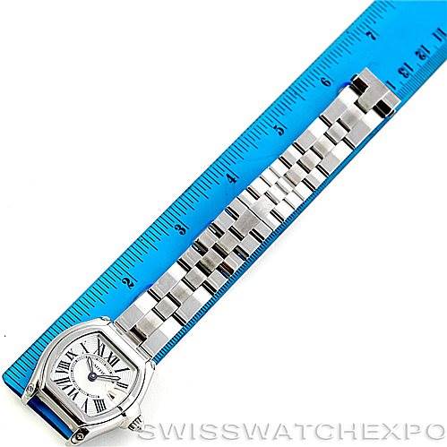 The image shows a Cartier Roadster W62016V3 Women's Stainless Steel Silver Dial W62016V3 Women's Stainless Steel Silver Dial watch laid flat next to a blue ruler, displaying its face and metal bracelet.