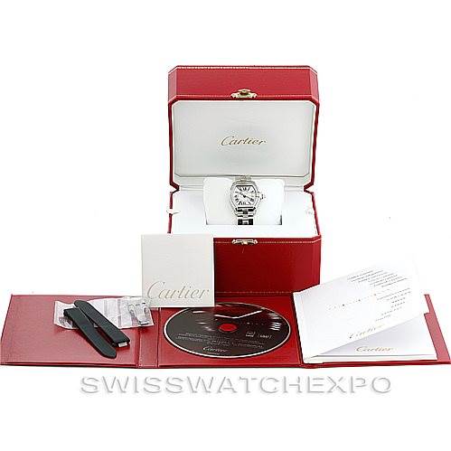 A Cartier Roadster W62016V3 Women's Stainless Steel Silver Dial W62016V3 Women's Stainless Steel Silver Dial watch is displayed inside its box, accompanied by its manual, warranty card, and additional accessories.
